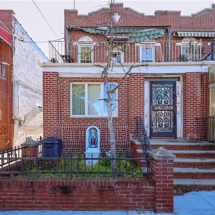 Buy this 6 bed townhouse on 8709 16th Avenue in New York, NY 11214