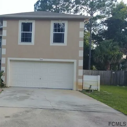 Buy this 4 bed house on 82 Pine Grove Drive in Palm Coast, FL 32164