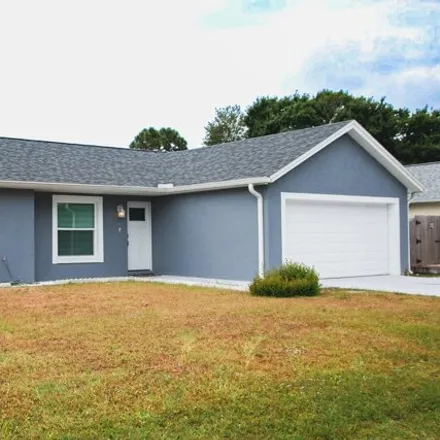 Rent this 3 bed house on 278 Umber Street Northwest in Palm Bay, FL 32907