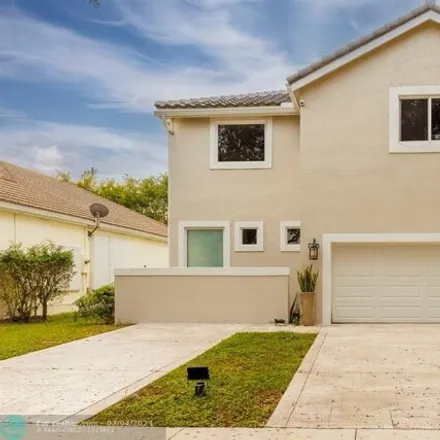 Rent this 4 bed house on 4043 Lansing Avenue in Cooper City, FL 33026