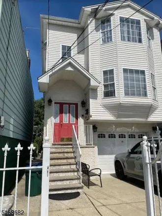Buy this 6 bed townhouse on 618 North 9th Street in Newark, NJ 07107