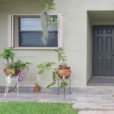 Buy this 3 bed townhouse on 8920-8934 Palm Tree Lane in Pembroke Pines, FL 33024
