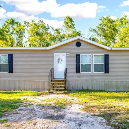 Buy this studio apartment on 23326 124th St in Live Oak, Florida