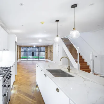 Buy this 4 bed townhouse on Mildmay Road in London, N1 4PR