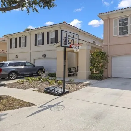 Rent this 3 bed townhouse on 2072 Tarpon Lake Way in West Palm Beach, FL 33411
