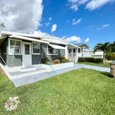 Buy this 3 bed house on Davie Road Extension in Davie, FL 33024