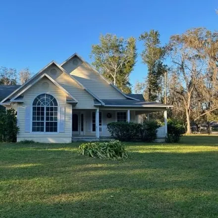 Rent this 3 bed house on 13810 Northeast 132nd Avenue in Alachua County, FL 32694