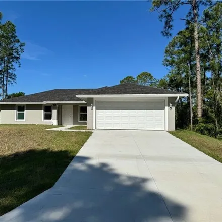 Rent this 3 bed house on 423 Windsor in Lehigh Acres, FL 33974
