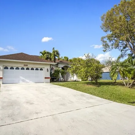 Buy this 4 bed house on 387 Southwest de Gouvea Terrace in Port Saint Lucie, FL 34984