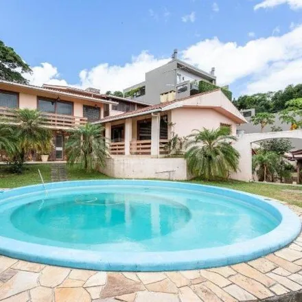 Buy this 5 bed house on Avenida Arlindo Pasqualini in Jardim Isabel, Porto Alegre - RS