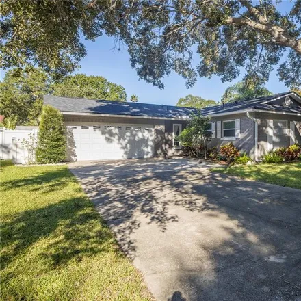 Buy this 3 bed house on 1590 Dinnerbell Lane East in Palm Harbor, FL 34698