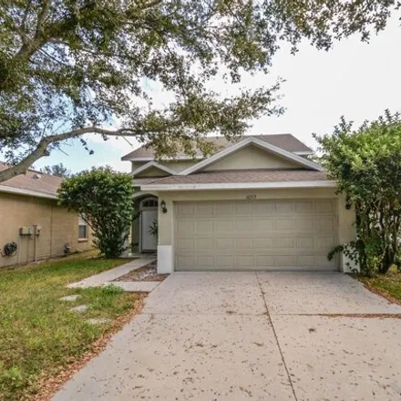 Rent this 4 bed house on 10313 Avelar Ridge Drive in Riverview, FL 33579
