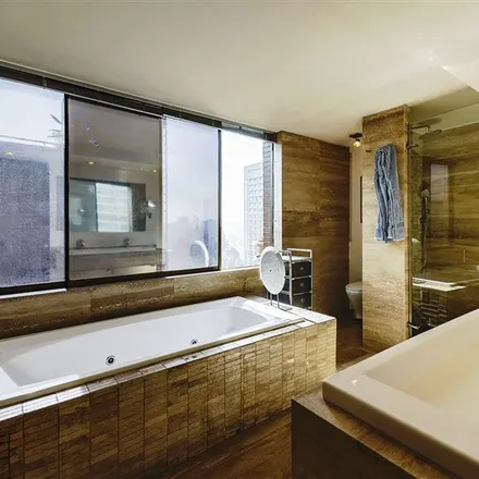 Buy this 3 bed apartment on Avenida El Golf 192 in 755 0163 Provincia de Santiago, Chile