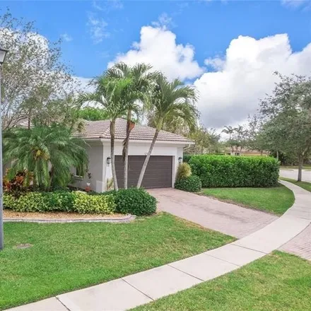 Buy this 4 bed house on 12199 Northwest 77th Manor in Parkland, FL 33076