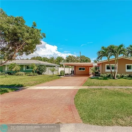 Buy this 4 bed house on 2231 Northeast 52nd Street in Coral Ridge Isles, Fort Lauderdale