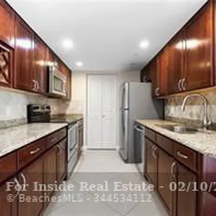 Rent this 3 bed apartment on Earnest Street in West Palm Beach, FL 33417