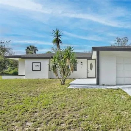 Buy this 3 bed house on 1196 Barbour Avenue Northwest in Port Charlotte, FL 33948