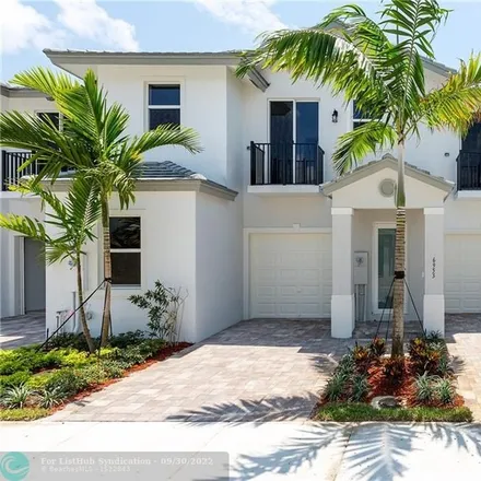 Rent this 3 bed townhouse on 7199 Hollywood Boulevard in Pembroke Pines, FL 33024