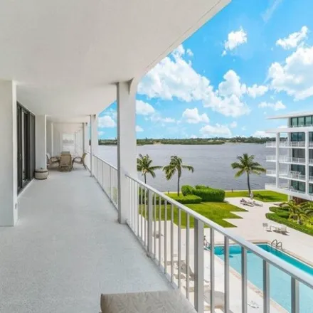 Rent this 2 bed condo on fish cleaning stand with running water in South Ocean Boulevard, Palm Beach