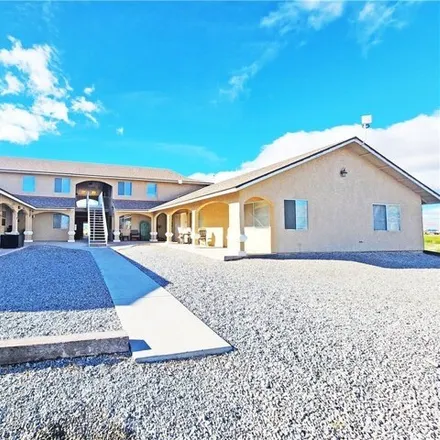 Rent this 2 bed house on 2361 East Calvada Boulevard in Pahrump, NV 89048