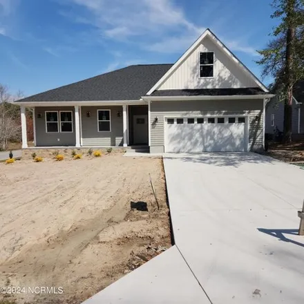 Buy this 3 bed house on 1569 Eyota Dr Sw in Ocean Isle Beach, North Carolina