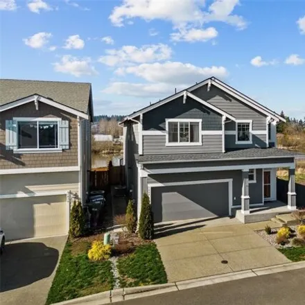 Buy this 4 bed house on 32nd Street Northwest in Puyallup, WA 98371