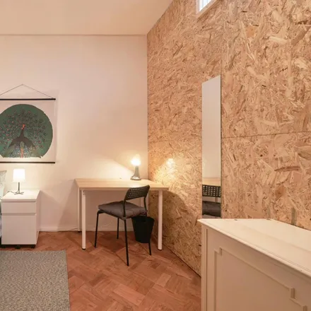 Rent this 8 bed room on Moreira de Sá in Rua de Cinco de Outubro, 4100-173 Porto