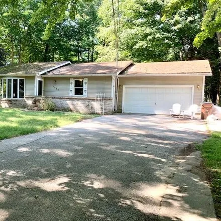 Buy this 3 bed house on 1333 Ivanhoe Road in Pere Marquette Charter Township, MI 49431