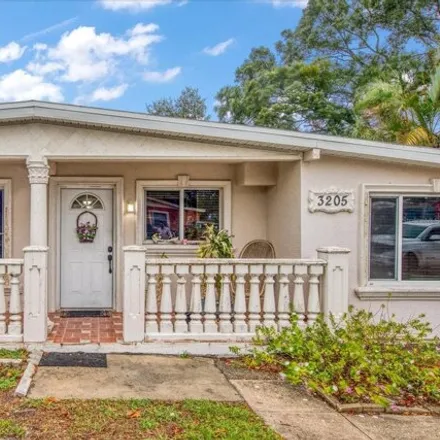 Buy this 4 bed house on 3233 West Rogers Avenue in Tampa, FL 33611