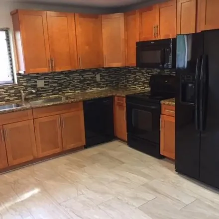 Rent this 3 bed apartment on 22322 Guadeloupe Street in Palm Beach County, FL 33433