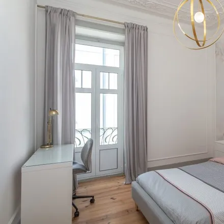 Rent this 7 bed room on Rua Azedo Gneco 6 in 1350-036 Lisbon, Portugal