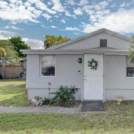 Rent this 2 bed house on 1754 Holman Drive in Juno Ridge, Palm Beach County