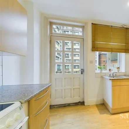 Rent this 3 bed apartment on Christopher Wren Yard in 113-119 High Street, London
