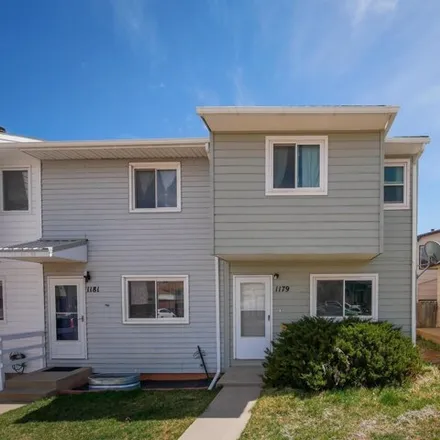 Buy this 3 bed townhouse on 1181 North 18th Street in Laramie, WY 82072