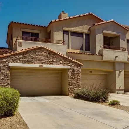 Rent this 2 bed townhouse on 19550 North Grayhawk Drive in Scottsdale, AZ 85255