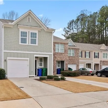 Rent this 3 bed house on 3065 Tarian Way in Panthersville, GA 30034