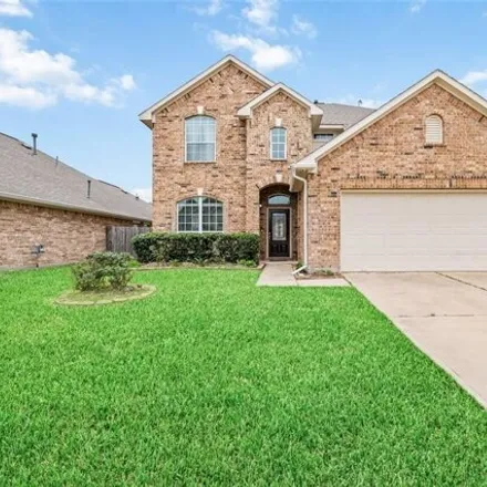 Rent this 4 bed house on 3009 Cimarron Pass Drive in Harris County, TX 77373