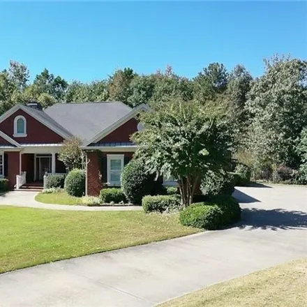 Buy this 5 bed house on 5222 Legends Drive in Braselton, GA 30517