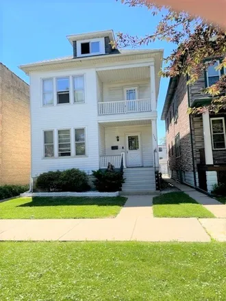 Buy this 4 bed duplex on 5332 North Luna Avenue in Chicago, IL 60630