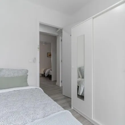 Rent this 4 bed room on Calle de Santa Florencia in 28021 Madrid, Spain