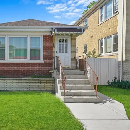 Buy this 2 bed house on 7421 West Belmont Avenue in Chicago, IL 60634