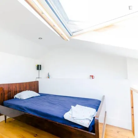 Rent this 4 bed room on Airbnb in Rua do Carrião, 1150-251 Lisbon