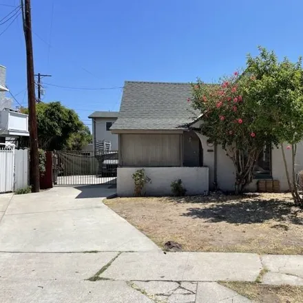 Buy this 4 bed house on 1708 South Marvin Avenue in Los Angeles, CA 90019