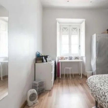 Rent this 4 bed room on Rua de Macau in 1170-132 Lisbon, Portugal