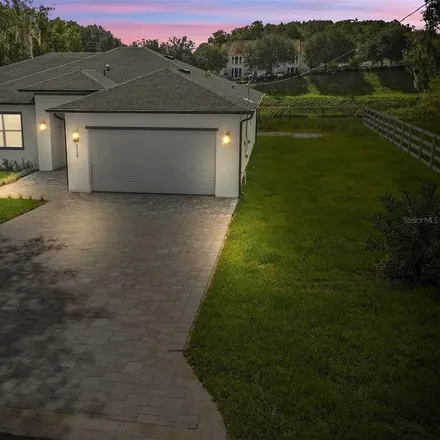 Buy this 4 bed house on 1115 Shady Oak Lane in DeLand, FL 32720