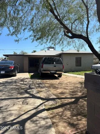 Buy this 4 bed house on 3 South 28th Drive in Phoenix, AZ 85009