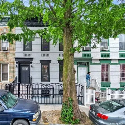 Buy this 7 bed house on 607 Warwick Street in New York, NY 11207