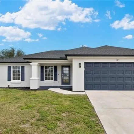 Buy this 3 bed house on 695 Northwest 17th Place in Cape Coral, FL 33993
