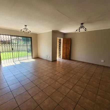 Rent this 3 bed townhouse on Albertyn Street in Vorna Valley, Midrand