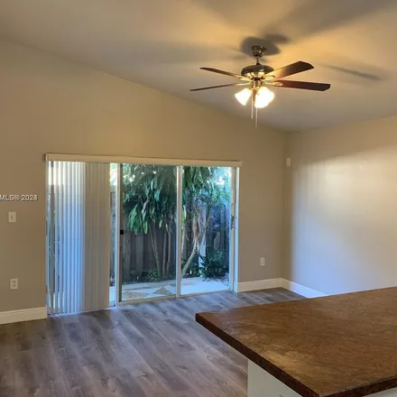 Rent this 3 bed apartment on 17156 Southwest 142nd Court in Richmond West, Miami-Dade County
